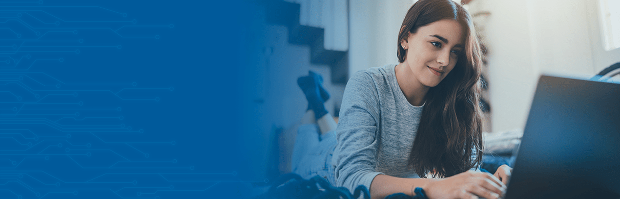 Female student using laptop