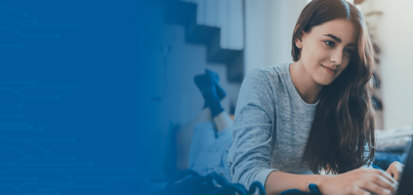 Female student using laptop